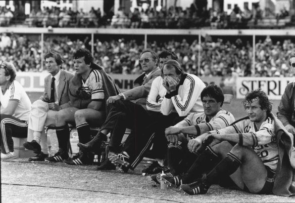 The looks tell the sad story on the losing bench with Manly coach Ray Ritchie, left, flanked by Les Boyd and a downcast Ray Brown, far right, with Terry Randall who decided to retire.