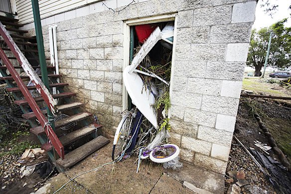 Emergency services search for bodies in the town of Grantham, in the Lockyer Valley, which was devastated by a sudden flood on January 10. Photo: Dean Saffron