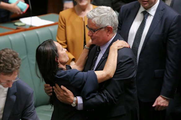 Liberal MP Ken Wyatt embraces Linda Burney.