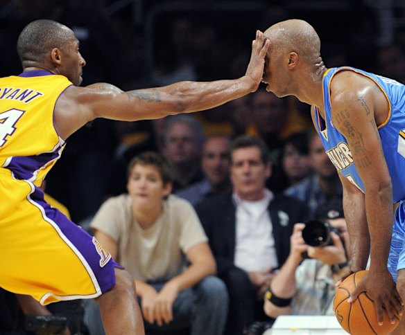 2009: Los Angeles Lakers guard Kobe Bryant defends Denver Nuggets guard Chauncey Billups during Game 1 of the NBA basketball Western Conference finals, in Los Angeles.
