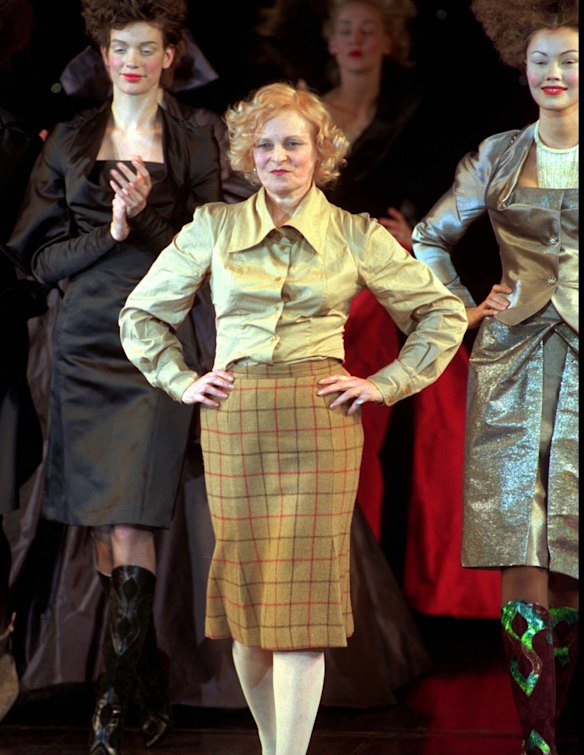 British fashion designer Vivienne Westwood is applauded by models after the presentation of her 1997-98 fall/winter ready-to-wear collection presented in Paris Friday March 14, 1997. 