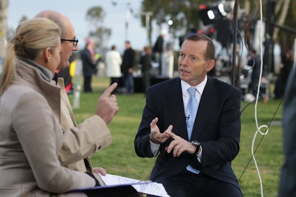 Opposition Leader Tony Abbott does breakfast television interviews out the front of Parliament House in Canberra on Thursday 27 June 2013.