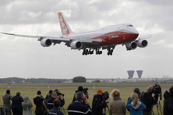 The new Boeing 747-8 Intercontinental jetliner lands at Le Bourget airport on the eve of the Paris Air Show.