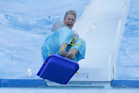 Samantha Armytage takes part in the slide into an ice bath during the "Big Freeze 2" charity event in Melbourne in 2016.