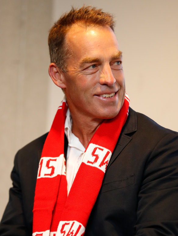 Alastair Clarkson in a Swans scarf.