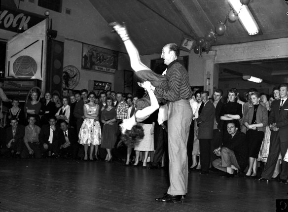 Exhibition of rock ’n roll dancing at the Rockdale Paradance Ballroom on September 14, 1956, the same night as the film premiere. The venue is decorated with a banner promoting the film.