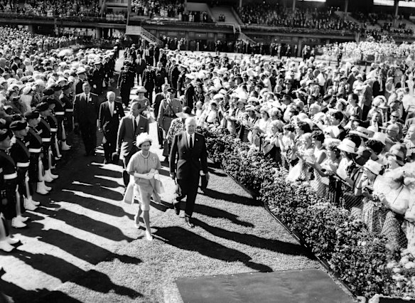 Queen Elizabeth and Prince Philip attend the Melbourne Cup in 1963.