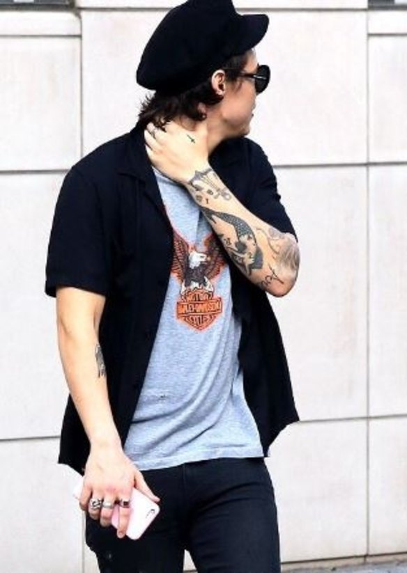 Accessories are a defining feature of Styles' look. After his SNL performance, Styles paired a logo shirt with a Greek fisherman’s cap, Saint Laurent sunglasses and his vintage statement rings, creating the ultimate 90s rock vibe.
Style Note: Harry Styles sure has style.
