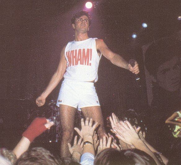 George Michael in 1985 wearing the famous WHAM! top - a feature in every teenager's wardrobe. 