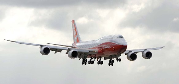 The new Boeing 747-8 Intercontinental lands at Le Bourget airport near Paris.