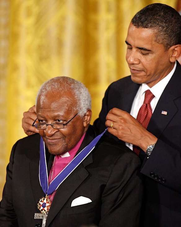 U.S. President Barack Obama (R) presents the Medal of Freedom to Bishop Desmond Tutu during a ceremony in the East Room of the White House in Washington, DC. Obama presented the medal, the highest civilian honor in the United States, to Desmond Tutu in 2009. 