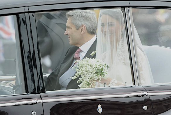 Kate Middleton travels in a Rolls Royce Phantom VI, accompanied by her father Michael Middleton to Westminster Abbey.
