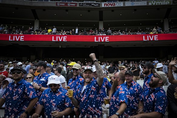 Australian fans celebrate on day one of the Boxing Day test.