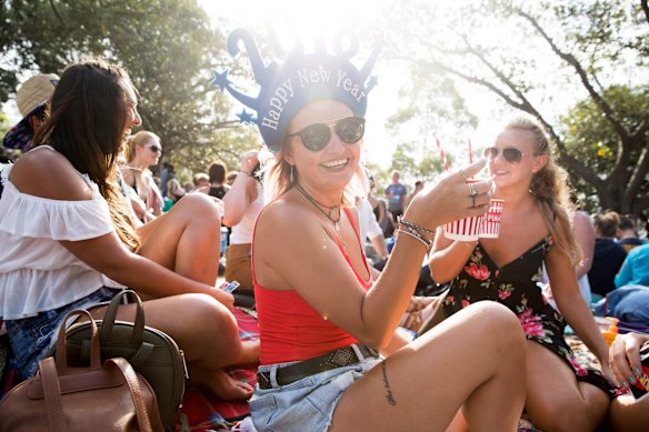 Becks Dunn  and her friends wait for the New Year's Eve fireworks at Mrs Macquaries Chair.