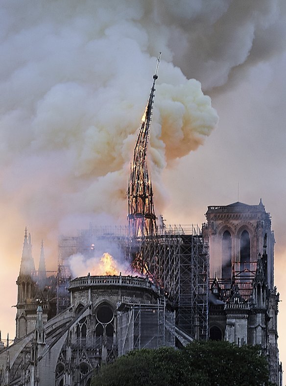 Massive plumes of yellow brown smoke is filling the air.