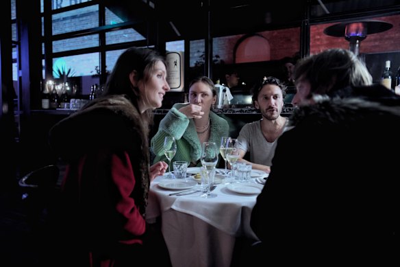 People enjoying the first hour of restaurants re-opening at the The Supper Club in Melbourne 