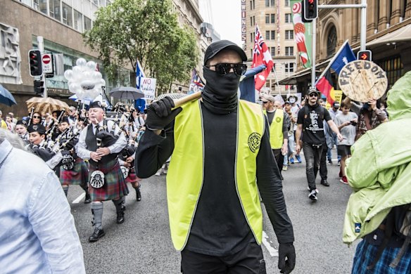 A protestor joins the World Wide Rally for Freedom March, in Sydney, against vaccine mandates and various other COVID related health orders.
