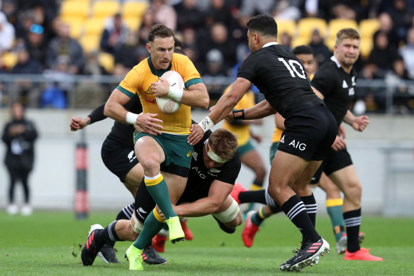 Determined: Nic White makes a break against New Zealand.