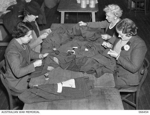 CWA members creating army uniforms.