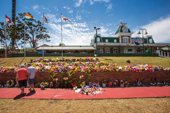 Flower tributes at Dreamworld where four people died after a malfunction with the 'Thunder River Rapids' at the theme park.