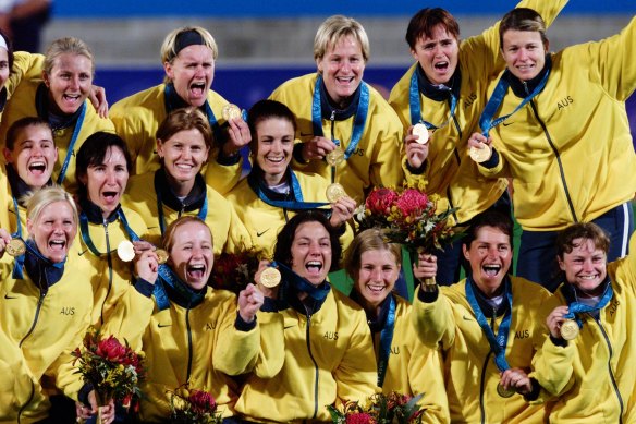 The Hockeyroos with their gold medals.