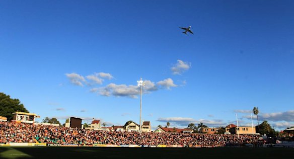 The crowd watches the Wests Tigers vs the Sydney Roosters at Leichhardt Oval.