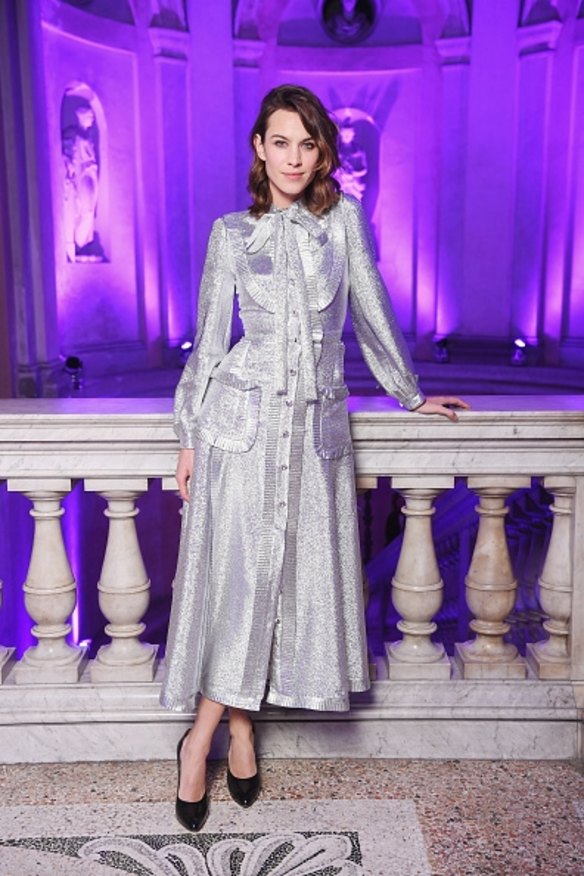 Alexa Chung changed into the metallic dress of our dreams for the Gucci party.