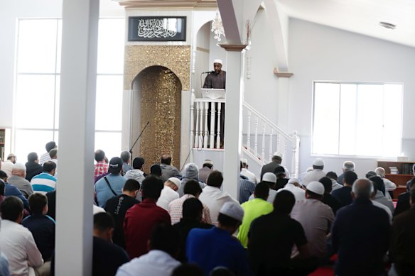 Friday prayers at a mosque attended by members of the Uighur community in Adelaide.