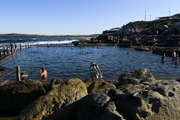 People flock to Maroubra beach as the temperature hits 28 degrees, during Sydney's lockdown.