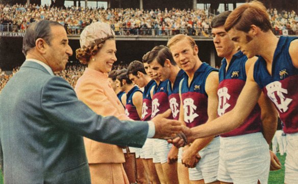 Queen Elizabeth shakes hands with Fitzroy players ahead of their match against Richmond at the MCG, 1970.