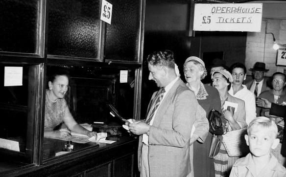 People queue up for Opera House Lottery tickets at the State Lotteries Office in Sydney on November 27, 1957. 