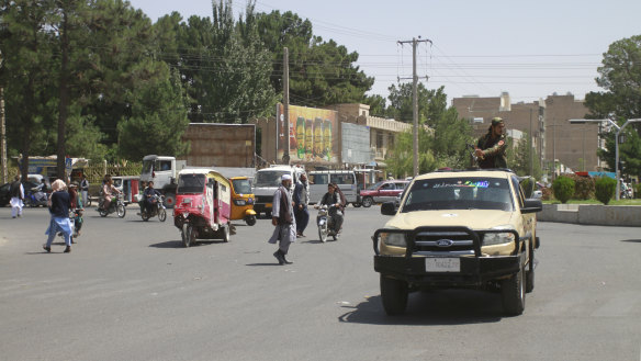 Members of the Taliban drive through the city of Herat, Afghanistan, west of Kabul, on Saturday.