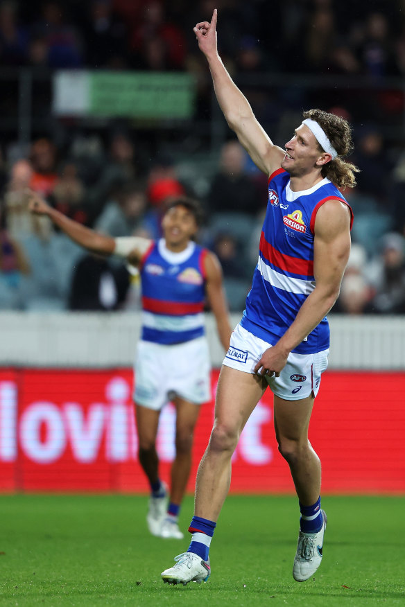 Aaron Naughton celebrates.