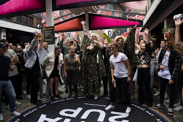 Two-up hosted by drag queen, Tora Hymen, at The Bank,  Newtown. Anzac Day. 25th April 2022 Photo Louise Kennerley
 SMH