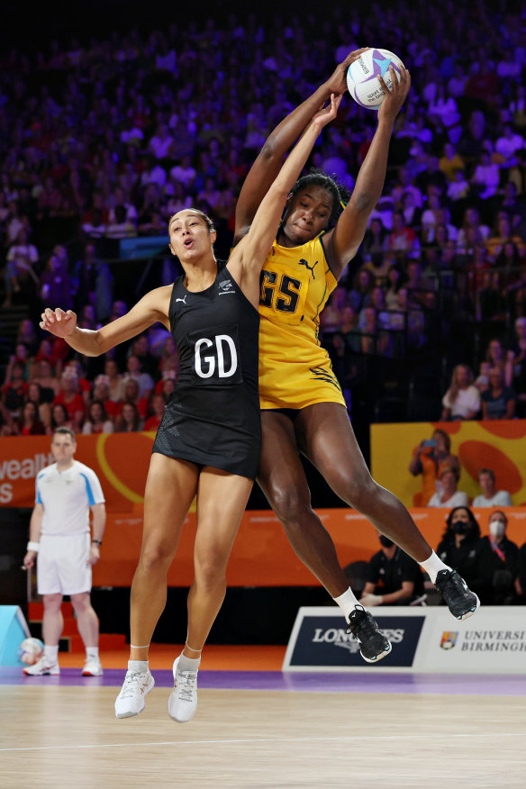 Jhaniele Fowler leaps for the ball.