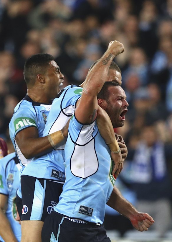 Boyd Cordner of the Blues celebrates after scoring a try.