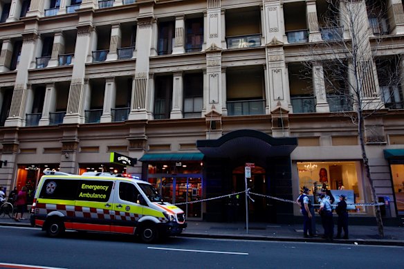 Emergency workers outside 118 Clarence Street, where a woman's body was found.
