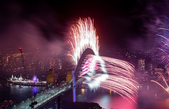 At midnight, a colourful display with bursts of neon, pastel and spinning fireworks blast into the sky to a soundtrack created by electronic music duo The Presets.