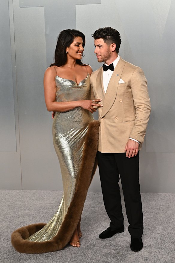 Priyanka Chopra Jonas and Nick Jonas arrive at the Vanity Fair Oscar Party.