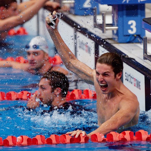 Pieter van den Hoogenband, of the Netherlands, celebrates winning the Men's 200m freestyle final.