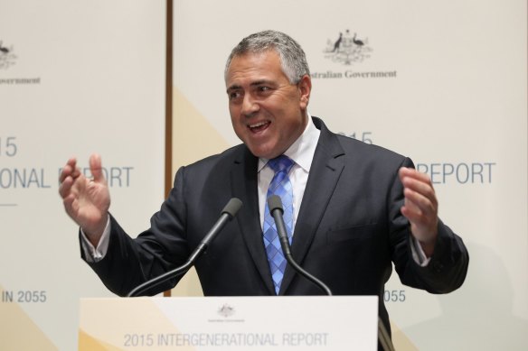 Joe Hockey releasing the last intergenerational report in 2015. Labor has signalled it would broaden the report’s remit and release one more often.