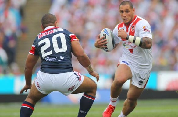 The Dragons Jeremy Smith lines up with the Roosters Lopinin Paea.
