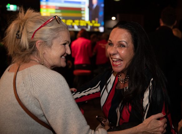 Linda Burney greets Australian Labor Party supporters as they watch the election count at the Canterbury-Hurlstone Park RSL Club.
