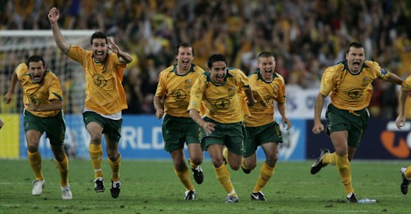 Australia celebrate as John Aloisi scores the winner after a penalty shoot-out against Uruguay that sends Australia to the 2006 World Cup in Germany. November 2005.