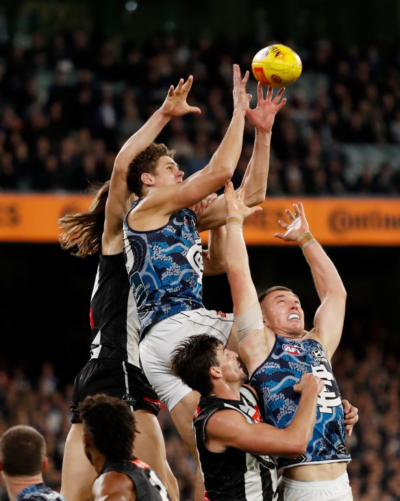Symbolic: Charlie Curnow soars high over the pack last week.