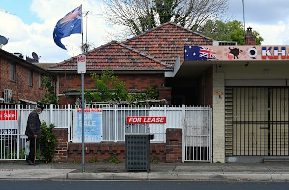 A man walks in front of his home in Fairfield. Many have lost work or livelihoods, others have lost lives due to COVID-19, and most are desperate to leave their homes. Several residents say it will take a long time for people to recover from the fear, anxiety and feelings of division that have seeded in the community for months.