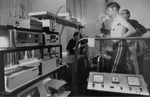 Marathon runner Cliff Young, watched by Dr Richard Telford, undergoes tests at the Australian Institute of Sports Complex on May 10, 1983.