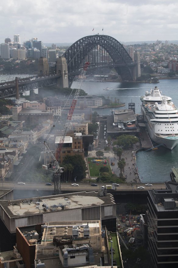 The fire on the corner of Pitt and Alfred Streets caused commuter issues with trains halted and the Cahill Expressway closed.