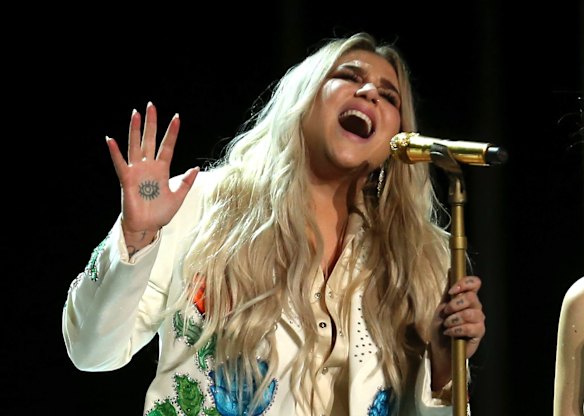 Kesha performs <i>Praying</i> at the 60th annual Grammy Awards.