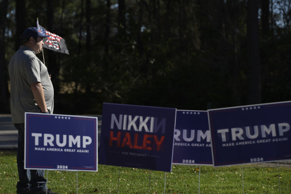 A supporter of Donald Trump outside a campaign event for rival Republican candidate Nikki Haley in Conway, South Carolina.
